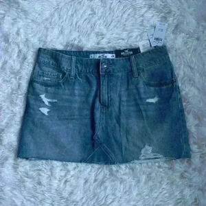 Hollister Denim Mini Skirt.  Size 9/waist 29.  Distressed w frayed edging. NWT.